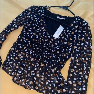 Francesca’s flowy blouse